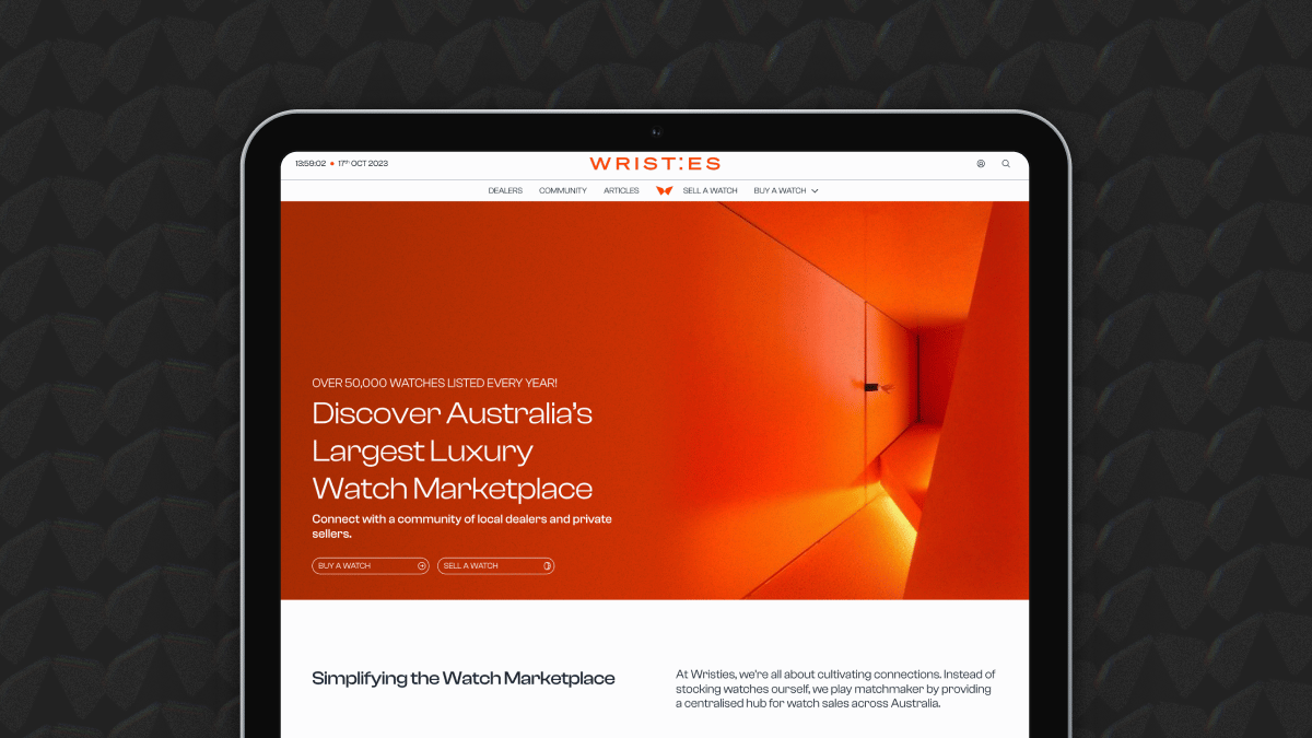 A web page for 'WRISTI•ES', Australia's largest luxury watch marketplace, is displayed on a tablet with a black bezel, set against a background featuring a dark, textured pattern. The website features a striking orange header with white text that reads 'OVER 50,000 WATCHES LISTED EVERY YEAR! Discover Australia’s Largest Luxury Watch Marketplace'. Below, there's a subheading saying 'Connect with a community of local dealers and private sellers.' Two call-to-action buttons, 'BUY A WATCH' and 'SELL A WATCH', are presented underneath. The webpage's design is modern and minimalistic, with a bold use of colour and typography.
